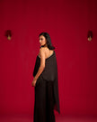 Black one-shoulder top and pant set.