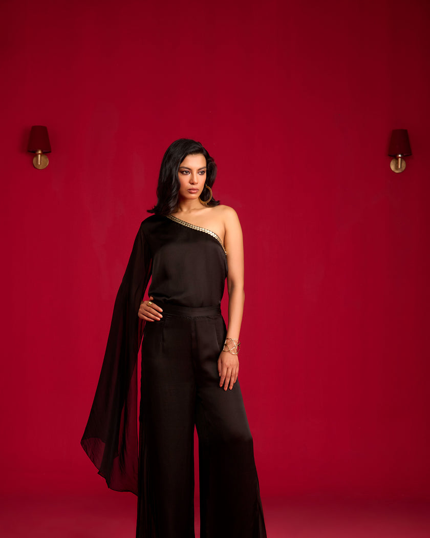 Black one-shoulder top and pant set.