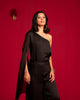 Black one-shoulder top and pant set.