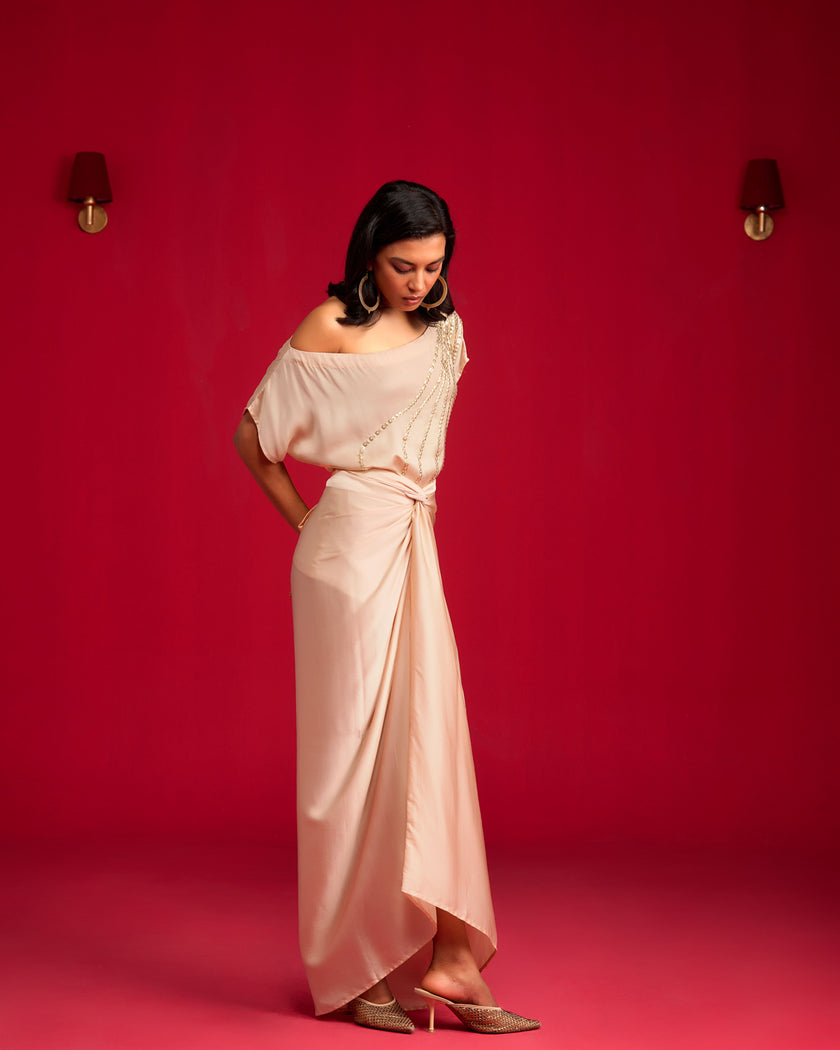 Ivory off-shoulder Top And Pants Set.